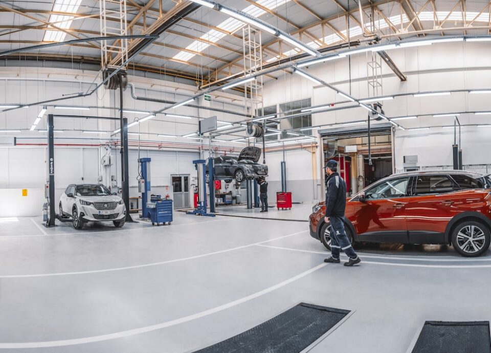 A car is parked inside of a garage