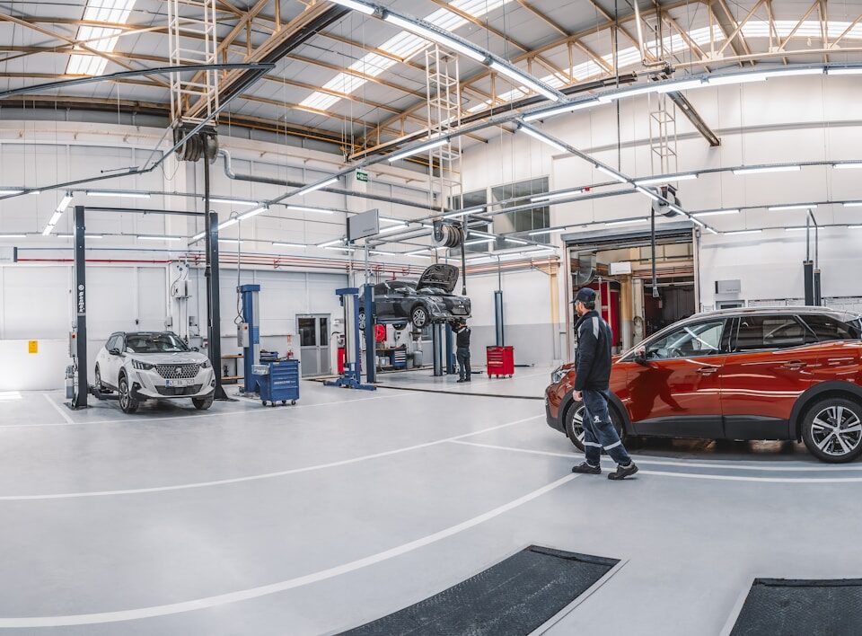 A car is parked inside of a garage